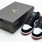 AJ1 Low Black Toe Sneaker